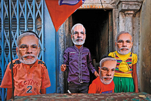 Children in Varanasi wearing Modi masks (April 24, 2014). Source: The Nation / http://www.thenation.com/article/181643/what-india?page=0%2C2